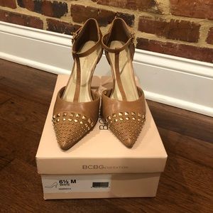BCBG tan leather heels with gold studs in size 6.5